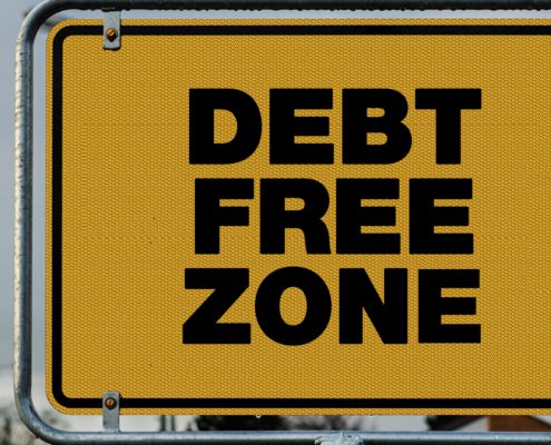 Image of a "Debt Free Zone" sign.